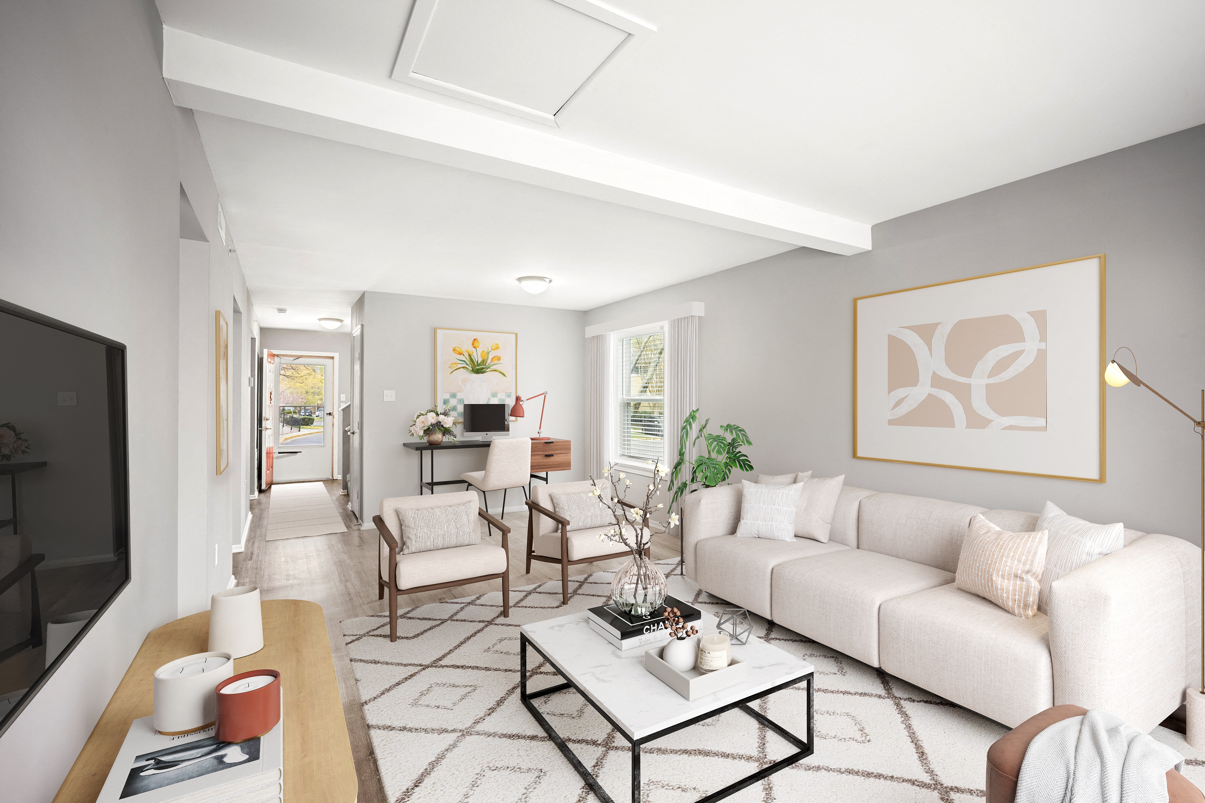 a living room with a couch and a table